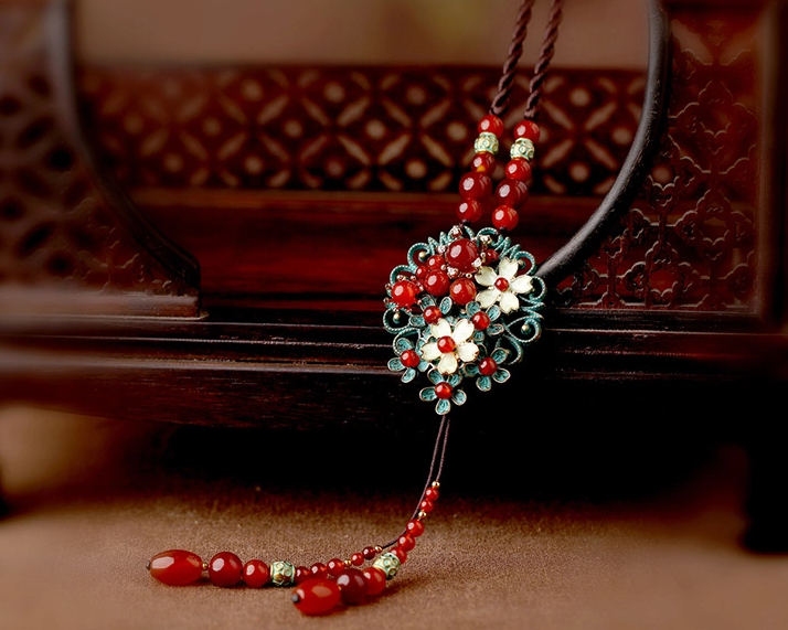 時尚家佳樂文學(xué)紅色瑪瑙鏤空花朵吊墜項鏈毛衣鏈