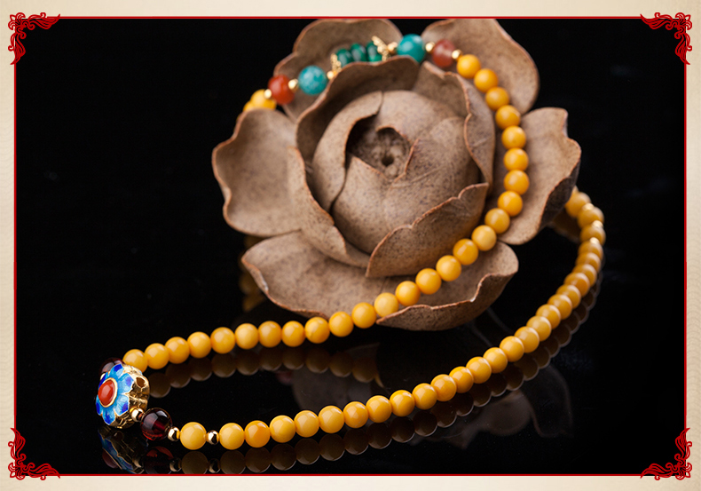 復(fù)古燒藍小花朵古典優(yōu)雅黃蜜蠟手串