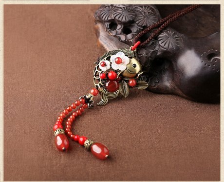 紅色氣質(zhì)古風(fēng)貝殼花毛衣鏈項鏈?zhǔn)罪? / data-YLKe=